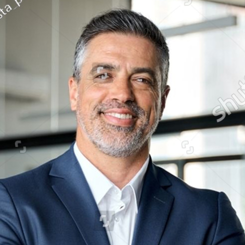 stock-photo-happy-mid-aged-business-man-ceo-standing-in-office-arms-crossed-smiling-mature-confident-2307212331